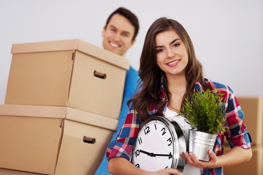 young couple moving in their home